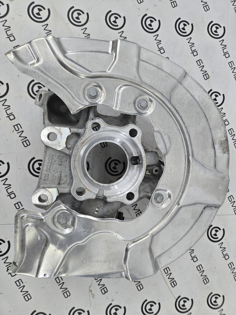 Кулак поворотный BMW X5 G05 Задн. Лев.