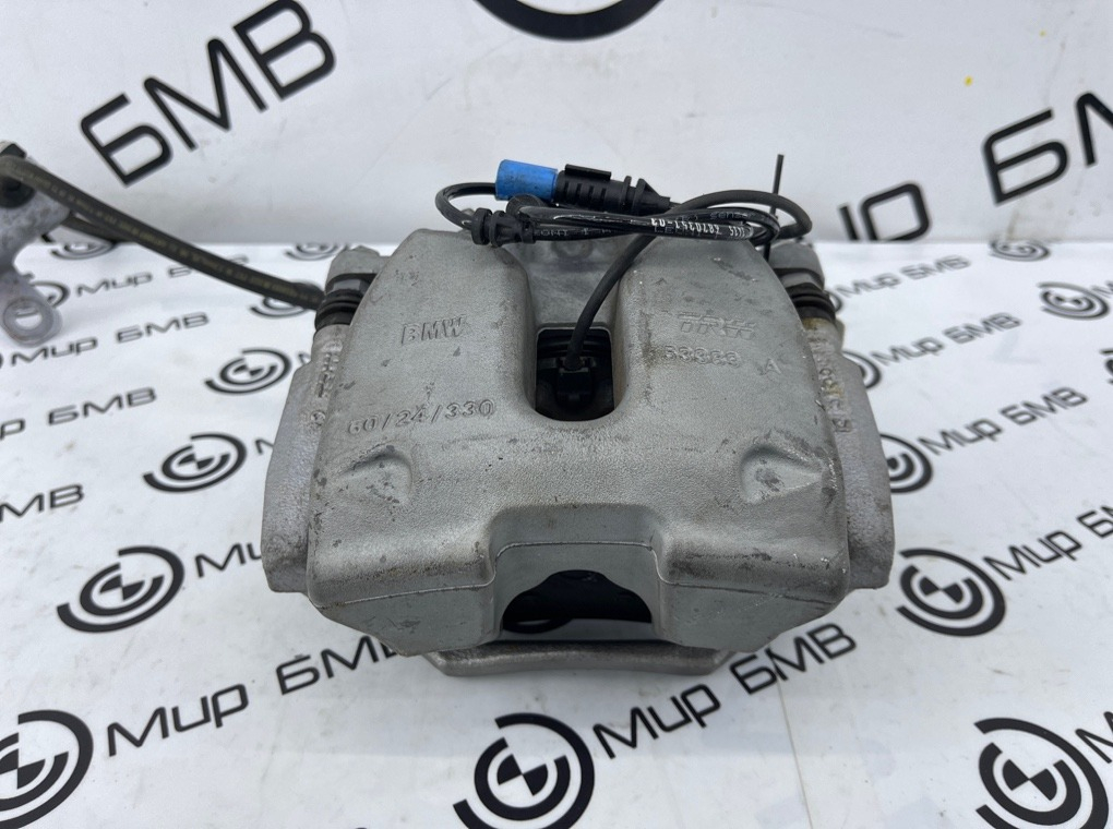 Суппорт тормозной BMW 3 - series G20 Перед. Лев.