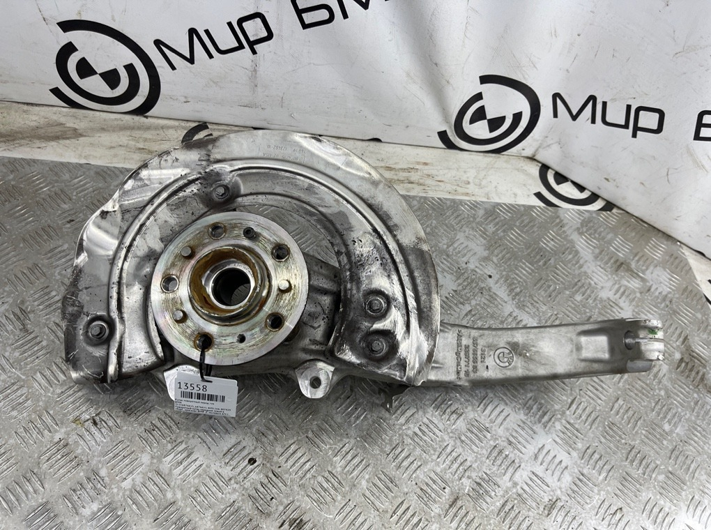 Кулак поворотный BMW X5 F95 Перед. Лев.