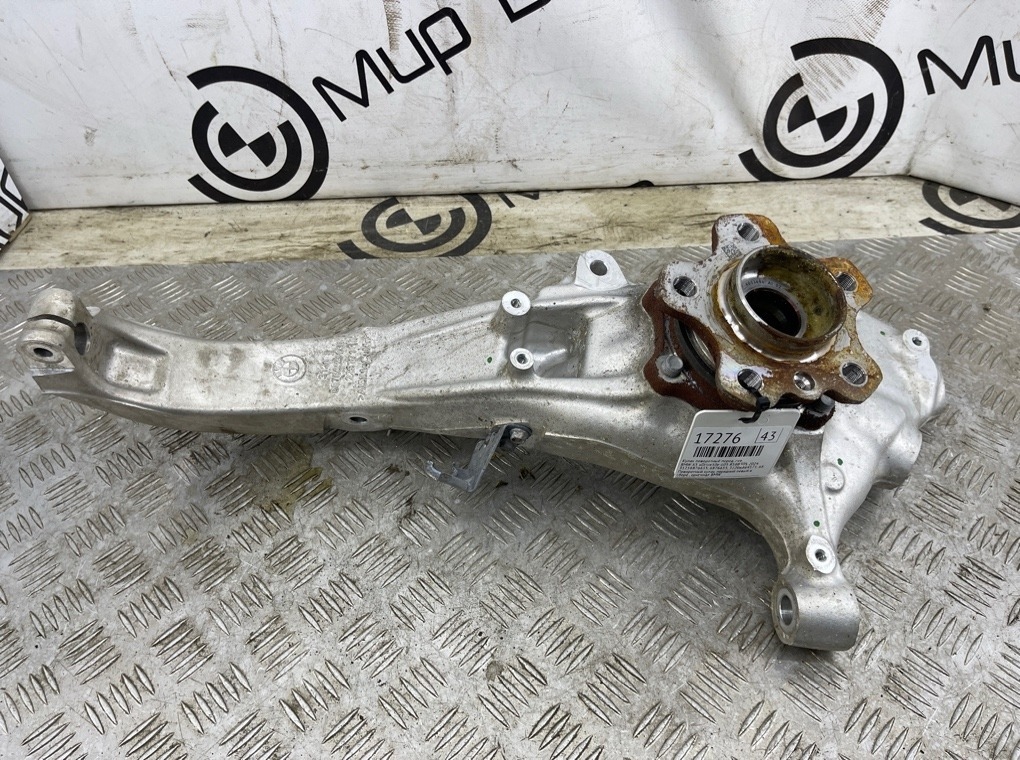 Кулак поворотный BMW X5 xDrive50e 2024 G05 B58B30S Перед. Лев.