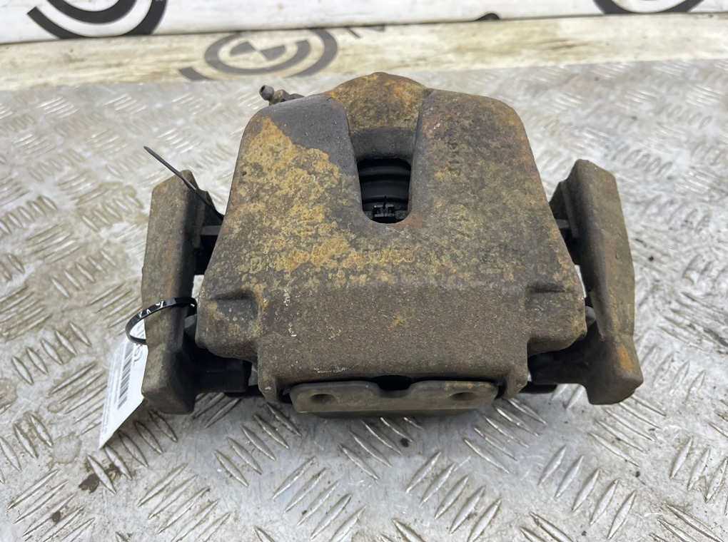 Суппорт тормозной BMW X5 E70 Перед. Лев.