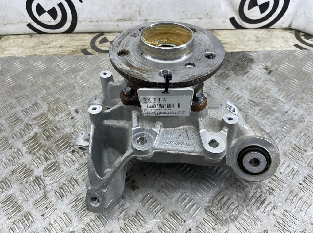 Кулак поворотный BMW X5 G05 Задн. Лев.